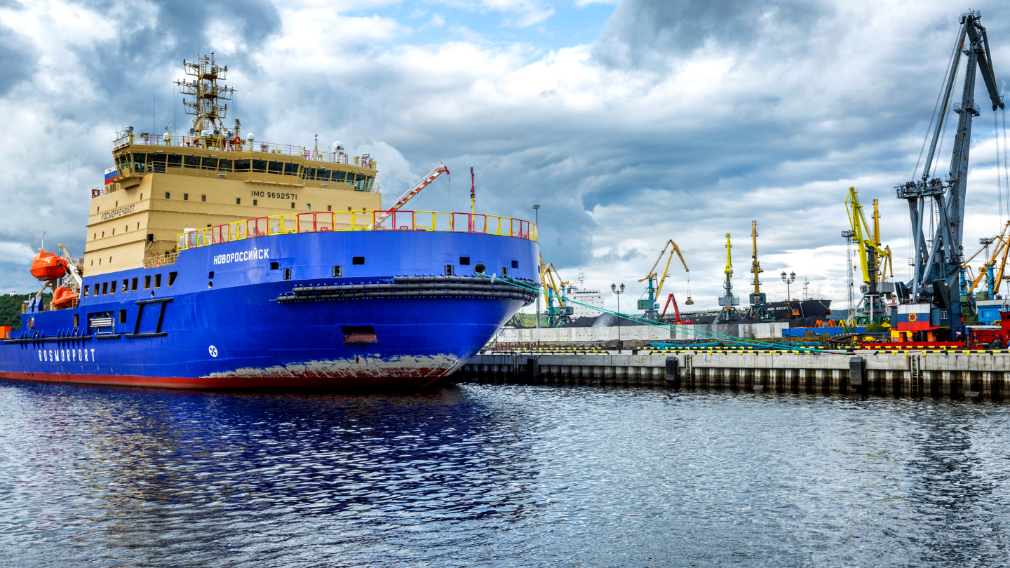Tug boat and ramp barge providing marine logistics support